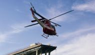 Fire fighters inspect from the helicopter the site of the collapsed Morandi Bridge in the port city of Genoa, Italy August 14, 2018. Reuters/Massimo Pinca