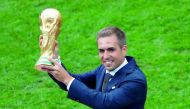 Former Germany player Philipp Lahm with the World Cup trophy at the Luzhniki Stadium, Moscow, Russia - July 15, 2018. Reuters/Maxim Shemetov