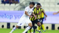 Qatar SC’s Samuel Eto’o vies for ball possession with an Al Sailiya player during their QNB Stars League (QSL) match here yesterday. Picture: Mohamed Farag
