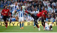 Brighton's Glenn Murray in action with Manchester United's Eric Bailly (REUTERS/David Klein)