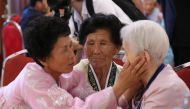 South Korean Lee Keum-yeon (R), 87, talks with her North Korean relatives as they bid farewell at the last meeting of a three-day family reunion event at North Korea's Mount Kumgang resort on August 22, 2018. South Korea OUT / REPUBLIC OF KOREA OUT / AFP 