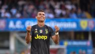 Juventus' Portuguese forward, Cristiano Ronaldo reacts after missing a shot during the Italian Serie A football match AC Chievo vs Juventus at the Marcantonio-Bentegodi stadium in Verona on August 18, 2018. / AFP / Alberto PIZZOLI