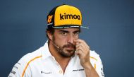 FILE PHOTO: McLaren's Fernando Alonso during a press conference ahead of the Belgian Grand Prix REUTERS/Francois Lenoir
