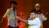 In this file photo taken on July 31, 2016 Moroccan singer Saad Lamjarred performs during the 52nd session of the International Carthage Festival at the Roman Theatre of Carthage, near Tunis. / AFP / FETHI BELAID