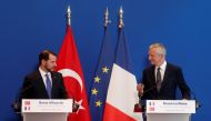 French Finance Minister Bruno Le Maire and Turkish Finance Minister Berat Albayrak attend a joint news conference after a meeting at the Bercy Finance Ministry in Paris, France, August 27, 2018. REUTERS/Benoit Tessier