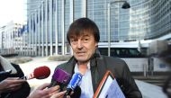 In this file photo taken on January 30, 2018 French Minister for the Ecological and Inclusive Transition Nicolas Hulot speaks to the press as he leaves the European Commission following an air quality ministerial summit at the EU headquarters in Brussels.