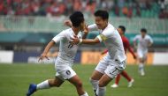 South Korea's Lee Seung-woo (L) celebrates with teammate Son Heung-min (R) after scoring during the men's football semi-final match between Vietnam and South Korea at the 2018 Asian Games in Bogor on August 29, 2018. / AFP / Arief Bagus