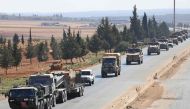 Turkish forces are seen in a convoy on a main highway between Damascus and Aleppo, near the town of Saraqib in Syria's northern Idlib province, on August 29, 2018. AFP / OMAR HAJ KADOUR