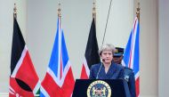 British Prime Minister Theresa May addresses a joint press conference with the Kenyan President at the State House in Nairobi on August 30, 2018.  AFP / Yasuyoshi Chiba
 
