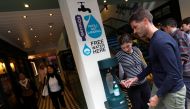 A new free drinking water fountain is used by passers-by in London, Britain August 28, 2018. Reuters/Peter Nicholls