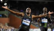 US athlete Christian Coleman (C) celebrates winning the men's 100m final of the Memorial Van Damme athletics event, the last meeting of the IAAF Diamond League competition on August 31, 2018 in Brussels. / AFP / JOHN THYS 
