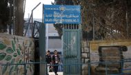 Children return to school at an establishment run by United Nations agency for Palestinian refugees (UNRWA) in Balata refugee camp, east of Nablus in the occupied West Bank on August 29, 2018, on the first day of classes after the summer holidays. AFP / J