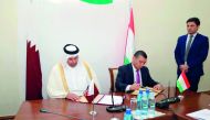 inister of Economy and Commerce H E Sheikh Ahmed bin Jassim Al Thani (left) and  Nematullo Hikmatullozoda, Minister of Economic Development and Trade of Tajikistan, signing a cooperation agreement on the sidelines of the third session of the Joint Economi