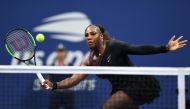 US Serena Williams hits a return to Czech Republic's Karolina Pliskova during their Women's Singles Quarter-Finals match at the 2018 US Open at the USTA Billie Jean King National Tennis Center in New York on September 4, 2018. / AFP / Don EMMERT