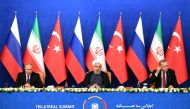 President Vladimir Putin of Russia, Hassan Rouhani of Iran and Tayyip Erdogan of Turkey attend a news conference in Tehran, September 7, 2018. Kirill Kudryavtsev/Pool via Reuters
