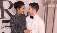Priyanka Chopra and Nick Jonas attend the Ralph Lauren fashion show during New York Fashion Week at Bethesda Terrace on September 7, 2018 in New York City. Rob Kim/Getty Images/AFP