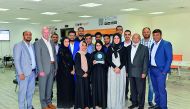 QPAY’s Group senior officials posing for a photo with the award.