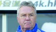 This file picture taken on April 9, 2016 shows then Chelsea's Dutch interim manager Guus Hiddink watching his players warm up ahead of the English Premier League football match between Swansea City and Chelsea at The Liberty Stadium in Swansea, south Wale