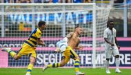 Parma's Italian defender Federico Dimarco (C) celebrates after opening the scoring during the Italian Serie A football match Inter Milan vs Parma on September 15, 2018 at the San Siro stadium in Milan. / AFP / Miguel MEDINA