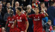  Liverpool's Roberto Firmino celebrates scoring their third goal Reuters/Phil Noble