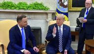 US President Donald Trump and Polish President Andrzej Duda(L)speak to the media in the Oval office at the White House on September 18, 2018 in Washington,DC. AFP / Nicholas Kamm