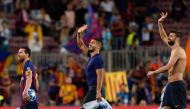 Barcelona's Argentinian forward Lionel Messi, Barcelona's Uruguayan forward Luis Suarez and Barcelona's Spanish defender Gerard Pique leave after the UEFA Champions' League group B football match FC Barcelona against PSV Eindhoven at the Camp Nou stadium 