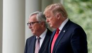 US President Donald Trump and European Commission President Jean-Claude Juncker walk together before speaking about trade relations in the Rose Garden of the White House, July 25, 2018/ Reuters/Joshua Roberts