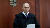 Hungarian judge Erik Mezolaki delivers the verdict in the case of Syrian-Cypriot Ahmed Hamed accused of illegally crossing the border and playing a part in a riot at Hungary's border with Serbia in September 2015, in Szeged, Hungary, September 20, 2018. R