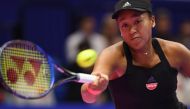 Japan's Naomi Osaka hits a return against Karolina Pliskova of the Czech Republic during their women's singles final at the Pan Pacific Open tennis tournament in Tokyo on September 23, 2018. AFP / Toshifumi Kitamura 