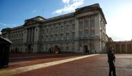 Armed police patrol the grounds of Buckingham Palace after a man was arrested at the visitor entrance of Britain's Queen Elizabeth's residence in London, Britain, September 23, 2018. REUTERS/Henry Nicholls