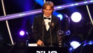 Real Madrid and Croatia midfielder Luka Modric speaks after winning the trophy for the Best FIFA Men's Player of 2018 Award during The Best FIFA Football Awards ceremony, on September 24, 2018 in London. / AFP / Ben STANSALL