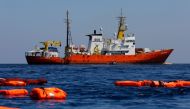 (FILES) This file photo taken on June 23, 2018 between Lampedusa and Tunisia shows Aquarius rescue vessel, chartered by French NGO SOS-Mediterranee and Doctors Without Borders (MSF), during a rescue drill at open sea. AFP / PAU BARRENA