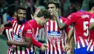 Atletico Madrid players  celebrate after Antoine Griezmann scored a goal during the La Liga match between Atletico Madrid and Huesca at Wanda Metropolitano on September 25, 2018 in Madrid, Spain. (Burak Akbulut - Anadolu Agency) 
