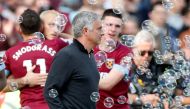 Manchester United manager Jose Mourinho looks dejected as West Ham players celebrate their third goal Action Images via Reuters/Matthew Childs 