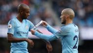 Manchester City's David Silva gives the captain's armband to teammate Fernandinho as he is substituted off Action Images via Reuters/Lee Smith 