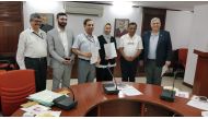 QRCS officials with representatives of IRCS and IFRC after signing an MoU. 