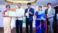 Indian Ambassador P Kumaran (second left) releasing the stamps commemorating the 150th birthday of Mahatma Gandhi.