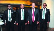 Siddeeque Akbar (second left), Vice President- Retail Banking and Marketing, Aman Bank, with M M Naina Marikar (second right), Head of Remittance Business, Aman Bank, and other officials in Doha. Pic: Abdul Basit/The Peninsula