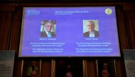 Per Stromberg, Goran K. Hansson and Per Krusell announce the laureates of the Nobel Prize in Economics during a press conference at the The Royal Swedish Academy of Sciences in Stockholm, Sweden, October 8, 2018.  TT News Agency
