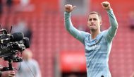 A television broadcast camera films as Chelsea's Belgian midfielder Eden Hazard applauds the fans following the English Premier League football match between Southampton and Chelsea at St Mary's Stadium in Southampton, southern England on October 7, 2018.