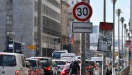 A sign restricting speed to 30km/h in order to curb pollution is seen along one of Berlin's busiest throughways, the Leipzigerstrasse, in Berlin on October 8, 2018.  AFP / John MACDOUGALL