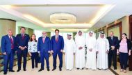 Sheikh Faisal bin Qassim Al Thani (centre), QBA Chairman, and Omar Al Bahi (fifth left), Tunisia’s Minister of Commerce, along with QBA members and Tunisian visiting delegation, yesterday.