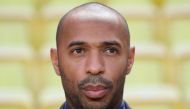 (FILES) In this file photo taken on September 18, 2018 Belgium's national football team assistant coach Thierry Henry looks on prior to the UEFA Champions League first round football match between AS Monaco and Atletico Madrid at the Stade Louis II, in Mo