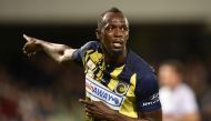 Olympic sprinter Usain Bolt celebrates scoring a goal for A-League football club Central Coast Mariners in his first competitive start for the club against Macarthur South West United in Sydney on October 12, 2018. / AFP / PETER PARKS 