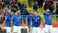Italy's defender Cristiano Biraghi (R) celebrates scoring with his teammates during the UEFA Nations League football match Poland v Italy at the Silesian Stadium in Chorzow, Poland on October 14, 2018. / AFP / Janek SKARZYNSKI