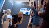 Pepper interacts with visitors at the SoftBank Robotics stand on the first day of the Mobile World Congress in Barcelonaon on February 27, 2017 (AFP/Lluis Gene) 