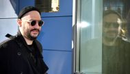 Russian stage and screen director Kirill Serebrennikov enters a courtyard in Moscow on October 17, 2018. The trial of Serebrennikov started more than a year after he was placed under house arrest in a controversial embezzlement probe. AFP / Alexander Neme