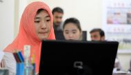 Reporters work at the office of Hushang a Mandarin language weekly newspaper in Islamabad, June 9, 2017. Reuters/Caren Firouz