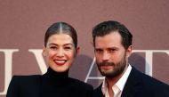 Actors Rosamund Pike and Jamie Dornan arrive at the European premiere of 