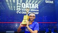 Mohamed El Shorbagy of Egypt poses for a picture after winning the 2017 Qatar Classic in Doha in this file picture.